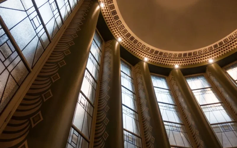 Stunning Art Deco architectural interior with decorative pillars and stained glass in Lahti, Finland.
